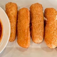 Rambo'S Mozzarella Sticks (T) · Whole milk grande mozzarella. Hand rolled in our house pecorino infused panko breadcrumbs. S...