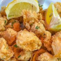 Fried Calamari · Always fresh marinated squid. Crispy and tender. Served with our Marinara.