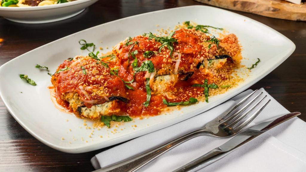 Vegan Eggplant Rollatini Dinner · Breaded Eggplant Rolled with Cashew Tofu Ricotta topped with Tomato Sauce and Daiya Mozzarella Served With Choice of Pasta or Salad.