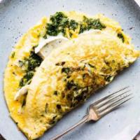 Beet & Spinach Omelette · Three egg omelette with chopped beet and baby spinach with goat cheese