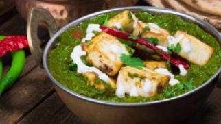 Palak Paneer · Fresh spinach cooked in a rice creamy onion gravy with a touch of luscious cashew and almond...