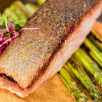 Salmon · Pan seared salmon, grilled asparagus,
sweet potato mash, orange-habanero sauce