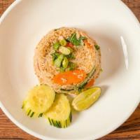 Thai Fried Rice · Thai style fried rice with egg, Chinese broccoli, carrot, onion, scallion, and cherry tomato.