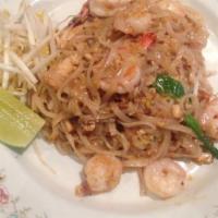 Pad Thai · Gluten-free. Rice noodle with egg, red onion, dried turnip, bean sprout, scallion, and crush...