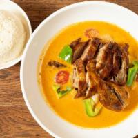 Duck Pineapple Curry · Spicy. Marinated crispy duck in pineapple curry with lychee, bell pepper, cherry tomato, and...