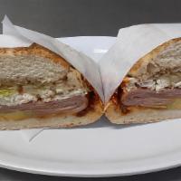 Ham Cemitas · Jamon. Served with refried beans, quesillo, chipotle, papalo, and avocado.