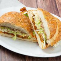 Queso De Puerco Cemitas · Served with refried beans, quesillo, chipotle, papalo, avocado and lettuce.