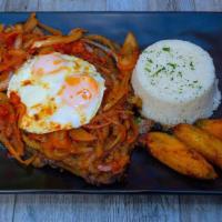 Bistec A Caballo · Steak w Creole sauce and fried egg on top