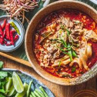 Pork Curry Noodles (Mikha-Ti) · Curry Noodle Soup with Coconut Milk, Fresh Herbs, & Lettuce