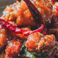 Sweet Chili Bell & Evans Chicken (Juen-Gai) · Fried garlic and chilies.