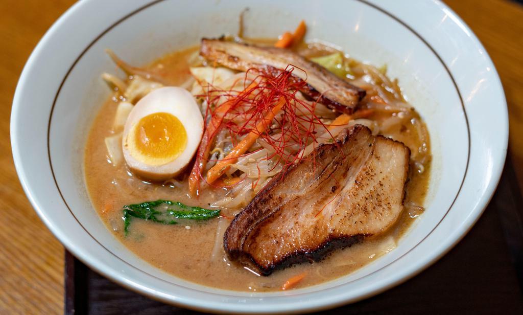 Miso Ramen · Favorite. Sapporo style miso infused with tonkatsu broth. Stir fried vegetables. Topped with grilled pork belly and marinated egg.