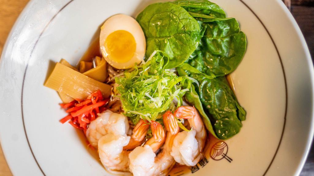 Shrimp Shoyu Ramen · Rich soy sauce based soup and noodles. Topped with bean sprouts, scallions, spinach, marinated egg, and shrimp