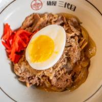 Gyudon · Stewed thin slices of beef on rice. Topped with pickled ginger and marinated egg.