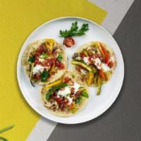 Vegan Taco Builder · Build your own vegan taco with your choice of toppings.