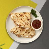 Vicious Veggie Quesadilla · Whole wheat tortilla with grilled onions, pinto beans, black beans, sauteed mushrooms, and l...