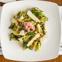 Brussel Sprouts · Gluten free, vegetarian. Frisse, pickled red onions, parmesean, sherry vinaigrette.