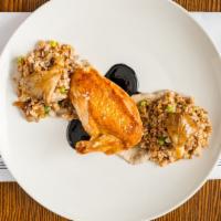 Curry Rubbed Roasted Chicken · House Blend Curry Rub, Israeli Couscous, Almonds, Golden Raisins, Olives, Mint, Charred Zucc...