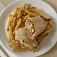 Chipotle Chicken Wrap · Grilled chicken, avocado, lettuce, tomato, Pepper-Jack and chipotle mayo. Served on whole wh...