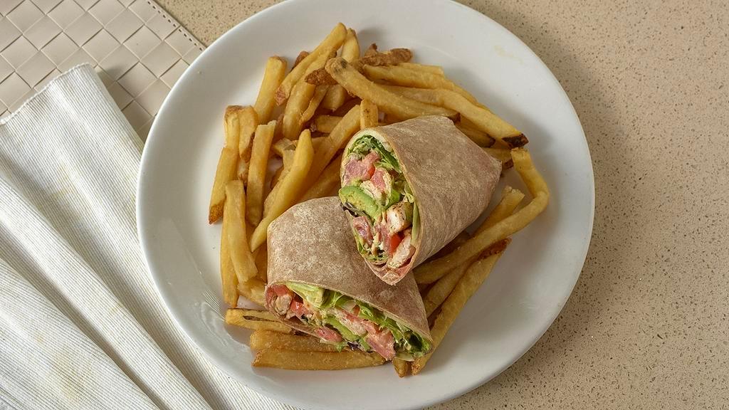 Chipotle Chicken Wrap · Grilled chicken, avocado, lettuce, tomato, Pepper-Jack and chipotle mayo. Served on whole wheat wrap. Includes fries, pickle, and slaw.