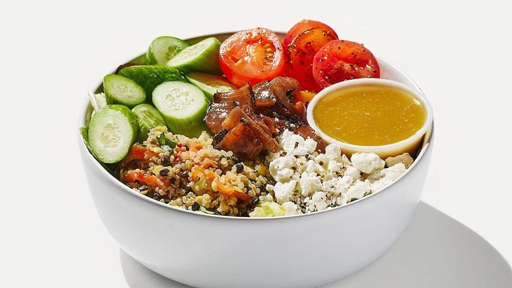 Mediterranean Salad · Quinoa & lentil, cucumbers, cherry tomatoes, grilled onions, and farm greens with mint, with seasoned feta cheese and rosemary vinaigrette on the side.