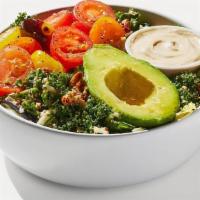 Kale Caesar Salad · Cashew Kale Caesar, farm greens with mint, avocado, shaved cauliflower, cherry tomatoes, spi...