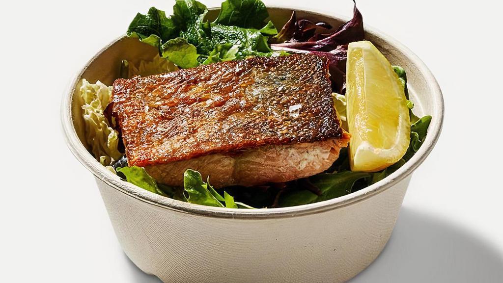 Wild Alaskan Salmon With Lemon Side · Grilled salmon (served medium) with a lemon wedge on the side.