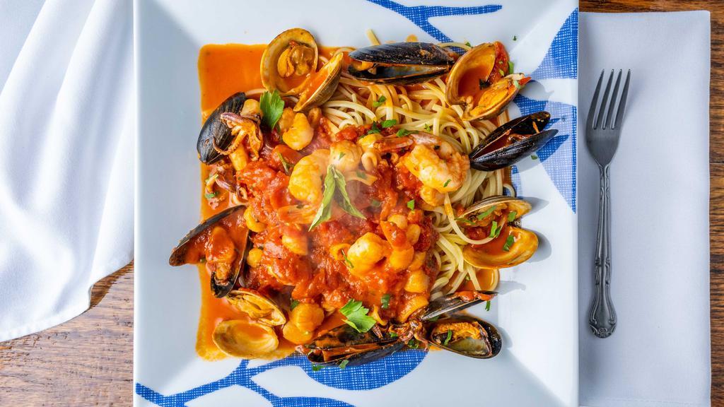Frutti Di Mare Seafood With Pasta · Sautéed shrimp, scallops, calamari, mussels and clams in marinara over linguine.
