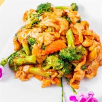 Chicken With Broccoli · Sliced white meat chicken, broccoli, carrot, house brown sauce.