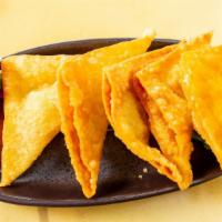 Crab Rangoon · 6 pcs. Scallion cream cheese-filled, fried wontons.