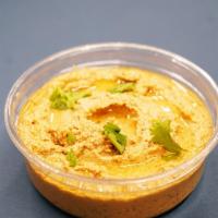 Baba Ghanoush · Eggplant puree, tahini, lemon, and olive oil. Contains dairy and sesame.