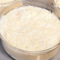Rice Pudding · Cooked rice, milk, sugar, butter, and vanilla.
