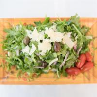 Arugula Salad · Tomato, onion, olives, shaved parmigiano cheese.