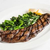 Grilled Skirt Steak · with broccoli rabe.