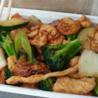 Subgum Wonton · Roast pork, chicken, jumbo shrimp and beef with assorted vegetables and golden wonton with w...