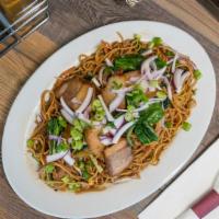 Pancit Habhab (Pancit Lucban) · stir-fried dried flour noodles and Asian veggies topped with crispy pork lechon & fresh red ...
