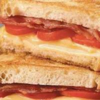 Grilled Cheese, Bacon & Tomato · Bacon, cheese (choice) & tomato on choice of bread.