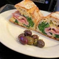 Little Piggy · Grilled black forest ham with broccoli rabe, honey mustard spread, topped with melted fontin...