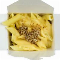 Truffled Macaroni And Cheese · Penne with truffle-cheddar cheese cream sauce.