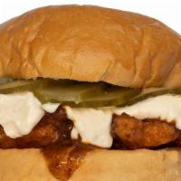 Nashville Hot Chicken Sandwich · Southern fried thigh, spicy hot sauce, mayo, dill pickles