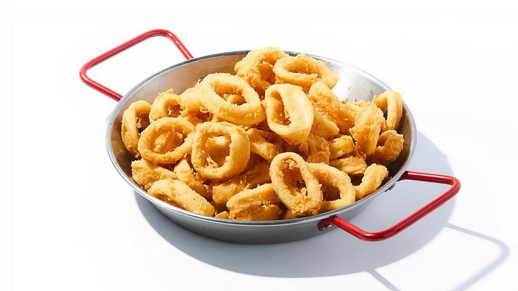 Fried Calamari · Deep fried and lightly breaded squid rings served with marinara and tartar sauce.