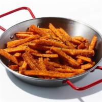 Sweet Potato Fries · Deep fried yam sticks topped with sugar.
