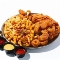 Fried Combo · Assorted fried appetizers: French fries, sweet potato fries, mozzarella sticks, onion rings ...