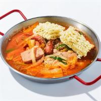 Budae Stew · Hot & spicy kimchi base soup with ham, sausage, pork belly, mixed vegetables, ramen noodle.
...