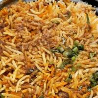 Goat Dum Biryani · Goat on bones is cooked in Basmati rice with spices and gravy in a very special way to captu...
