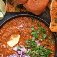Pav Bhaji · Vegetable gravy served with soft dinner rolls
