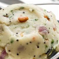 Upma · Cream of wheat cooked with onions, chillies, ginger, nuts and butter