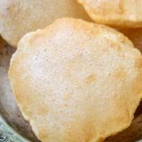 Poori (2 Pieces) · Deep-fat fried bread made from unleavened whole-wheat flour