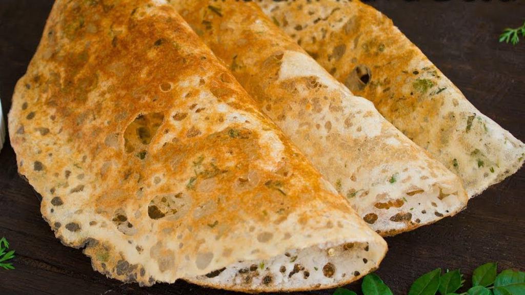 Rava Masala Dosa · Crispy thin crepe made of cream of wheat and rice floor and stuffed with potato filling