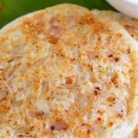 Onion Uthappam · Thick pancake (made with rice flour and lentil) with onions