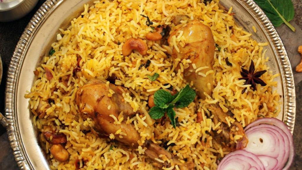 Chicken Dum Biryani · Chicken cooked with spices and basmati rice